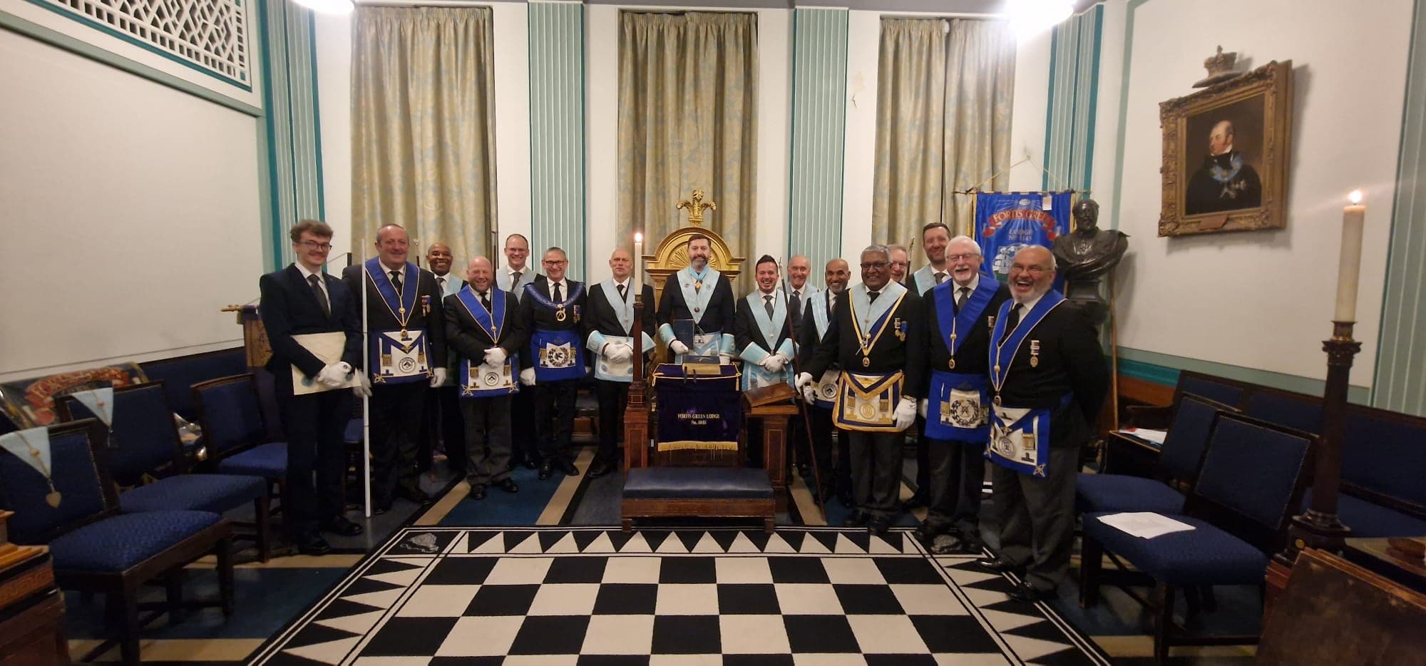 Fortis Green Lodge members in regalia during a ceremony